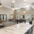 a large room with a large island and tables