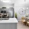 brightly lit kitchen adjacent to dining area